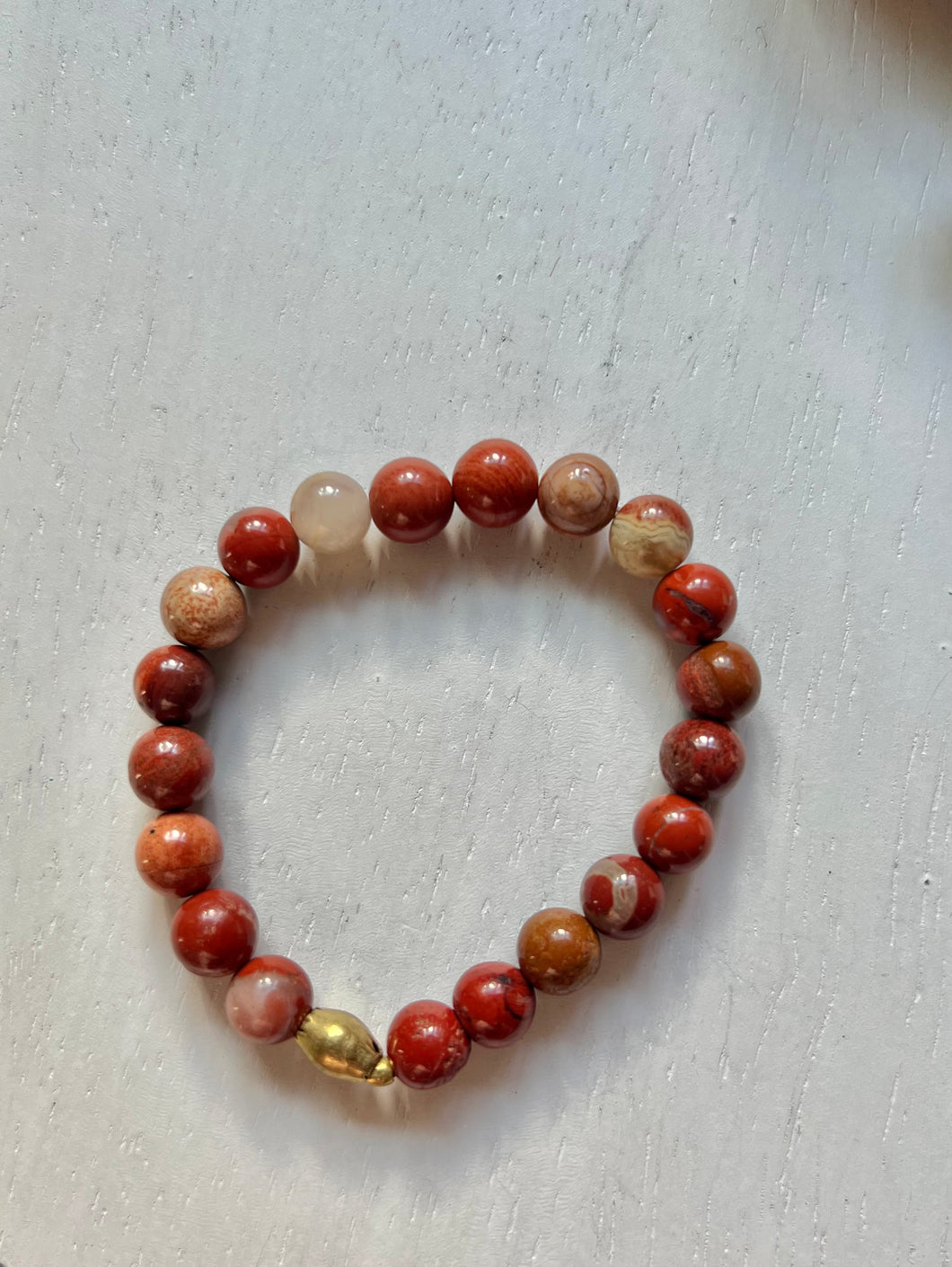 Red jasper 8mm beads with brass Bracelet