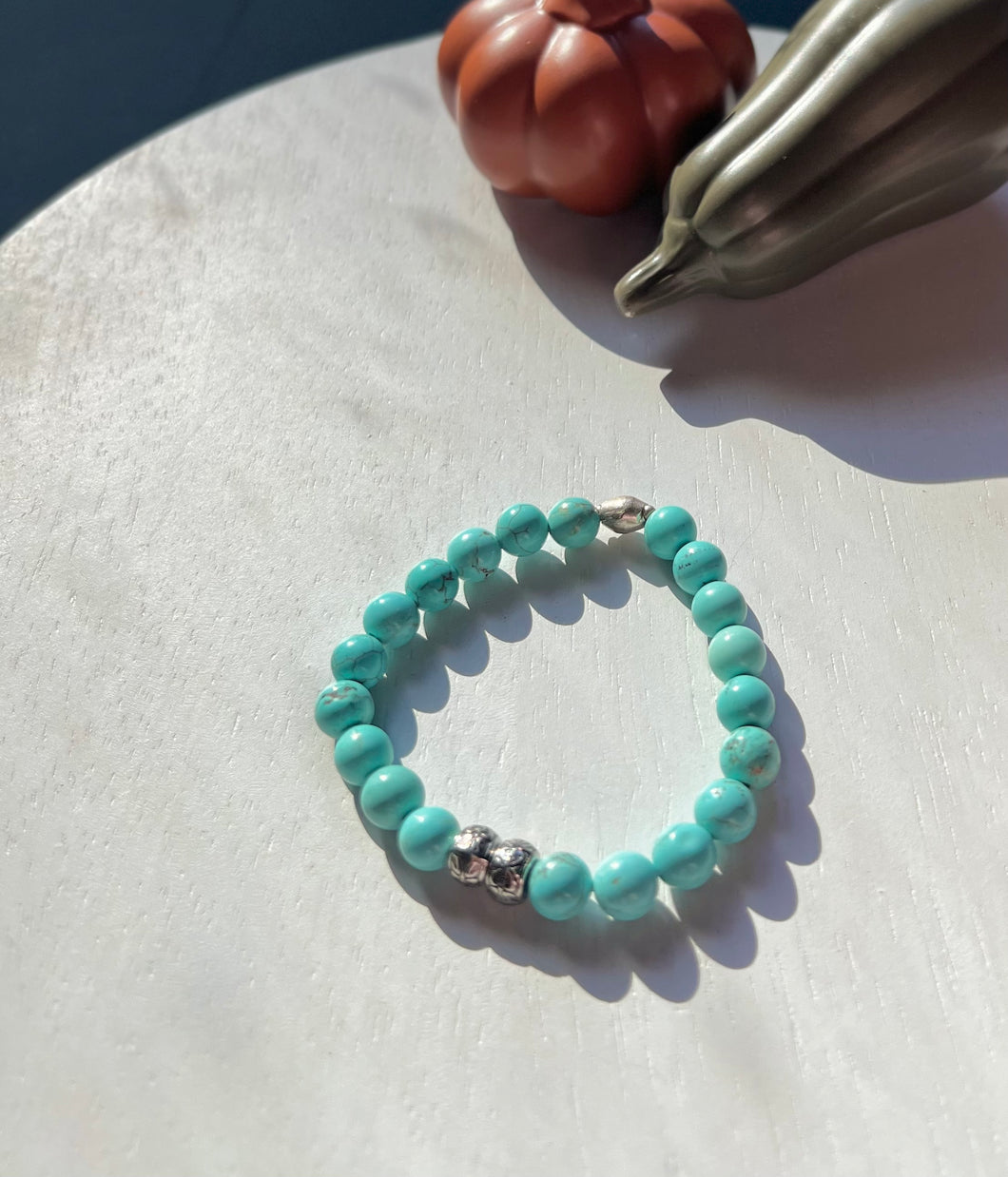 turquoise howlite 8mm beads with brass bracelet